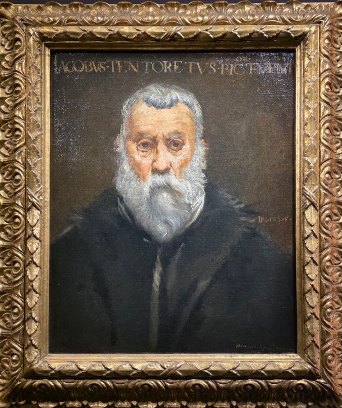 Portrait d'un homme âgé avec une longue barbe grise, vêtu d'une tunique noire, dans un cadre doré. Le texte en haut indique 'JACOBVS TEN TORE TVS PICTVM'.